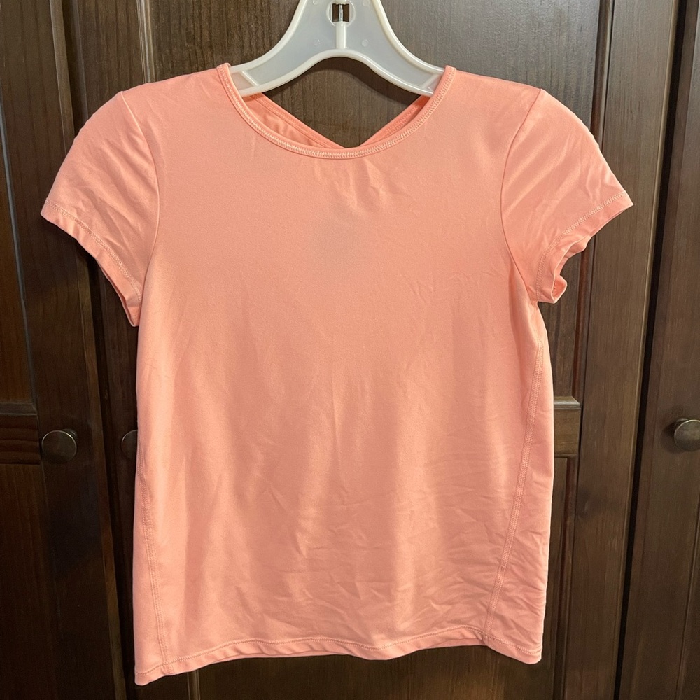 Girls All In Motion peach athletic top size medium